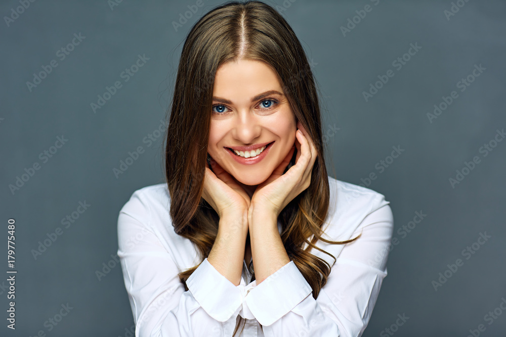 Smiling woman wearing white shirt close up face portrait. Smiling woman wearing white shirt close up face portrait.