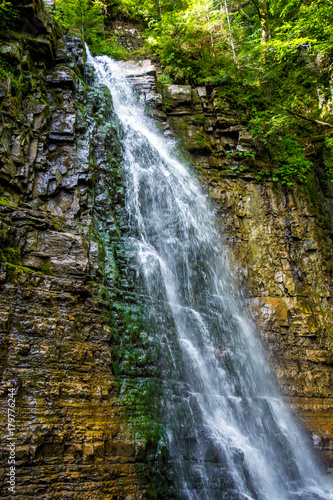 Photo of high waterfall in Carpathian mountains