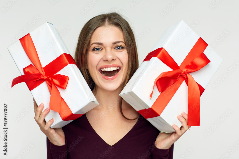 Happy woman holding gifts boxes with red ribbons. Happy woman holding gifts boxes with red ribbons.