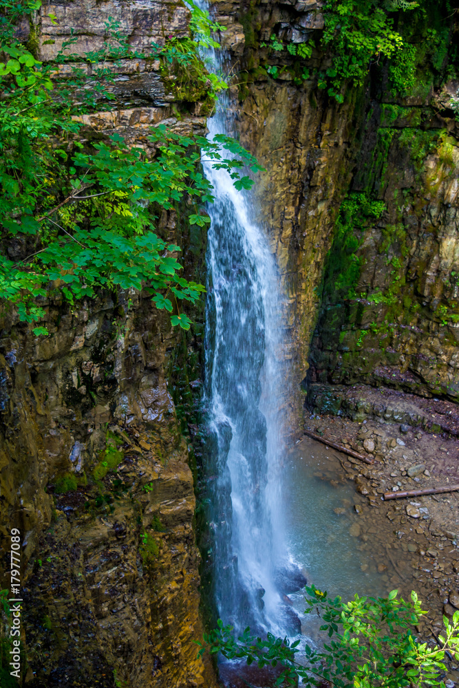 Photo of high waterfall in Carpathian mountains Photo of high waterfall in Carpathian mountains