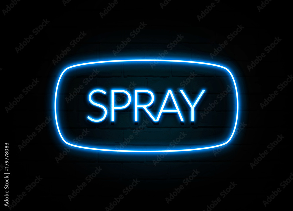Spray - colorful Neon Sign on brickwall Spray - colorful Neon Sign on brickwall