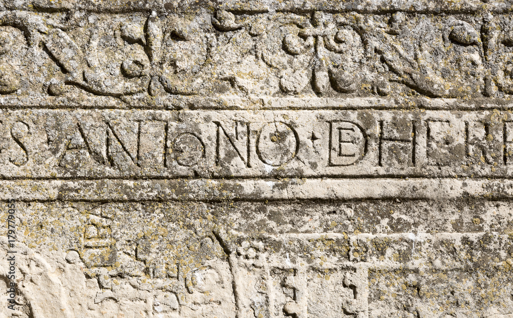 Ancient latin inscription carved in stone 