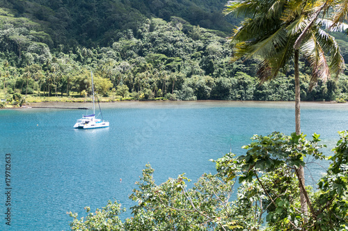 Catamaran at anchor in lagoon