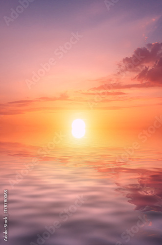 Photo of a heavenly sunset and a bright sun over the sea for wallpaper on your computer desktop. © Sviatoslav Khomiakov