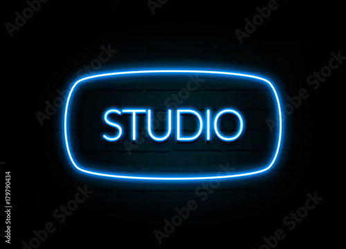 Studio - colorful Neon Sign on brickwall