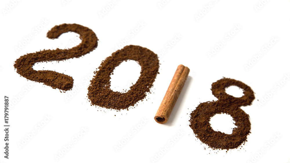 Happy New Year 2018, 2018 write from Coffee Powder and Cinnamon Stick on White Background Natural Light Selective Focus Happy New Year 2018, 2018 write from Coffee Powder and Cinnamon Stick on White Background Natural Light Selective Focus