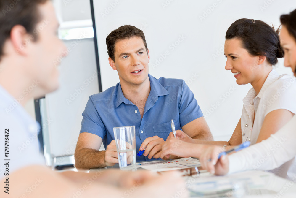 Young man in casual in office Young man in casual in office