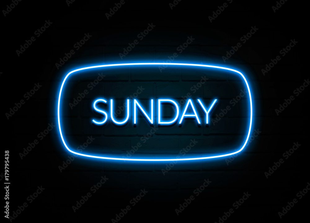 Sunday - colorful Neon Sign on brickwall Sunday - colorful Neon Sign on brickwall