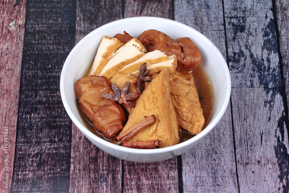 Chinese Vegetable festival food as fried tofu and fermented flour in brown soup. Chinese Vegetable festival food as fried tofu and fermented flour in brown soup.