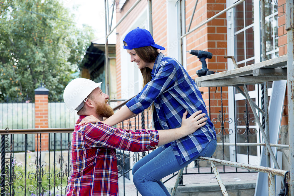 Couple building a house Couple building a house