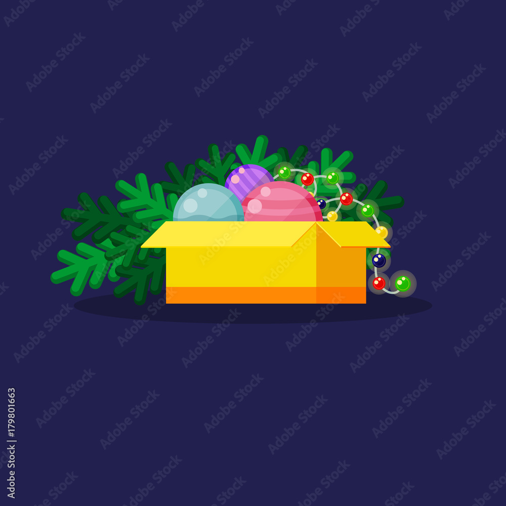 Obraz premium Box with Christmas toys and fir tree branches.