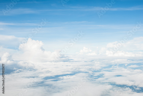 Aerial view of beautiful cloud layer in blue sky background © Atstock Productions