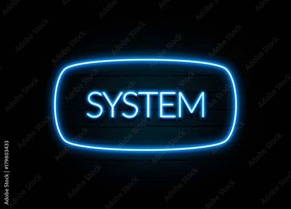 System - colorful Neon Sign on brickwall System - colorful Neon Sign on brickwall