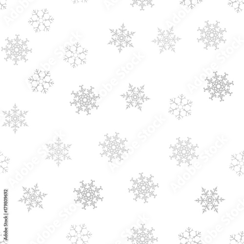 Seamless pattern. Christmas abstract background made of snowflakes on white. Design postcards, posters, greeting for the new year.