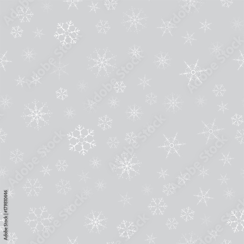 abstract seamless pattern of snowflakes. Christmas background for design of posters, postcards, invitation for the new year. © alexey_korotky