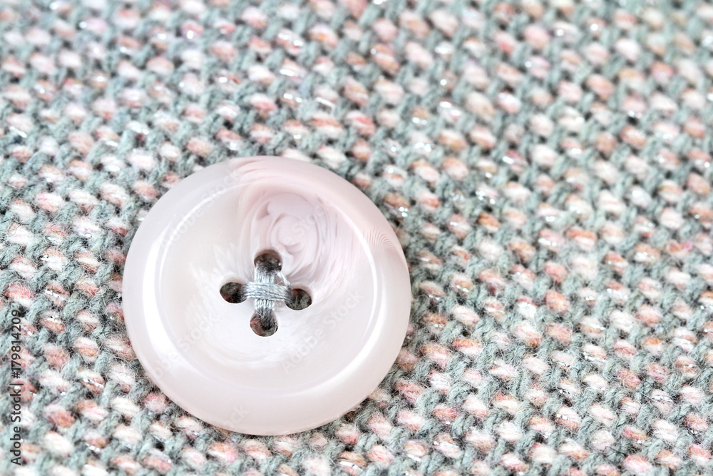 Macro image of a jacket button Macro image of a jacket button