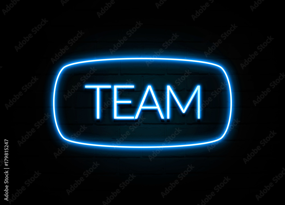 Team - colorful Neon Sign on brickwall Team - colorful Neon Sign on brickwall