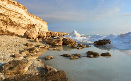 On the shore of the Caspian Sea. The Caspian Sea is the largest enclosed inland water body on Earth by area.
