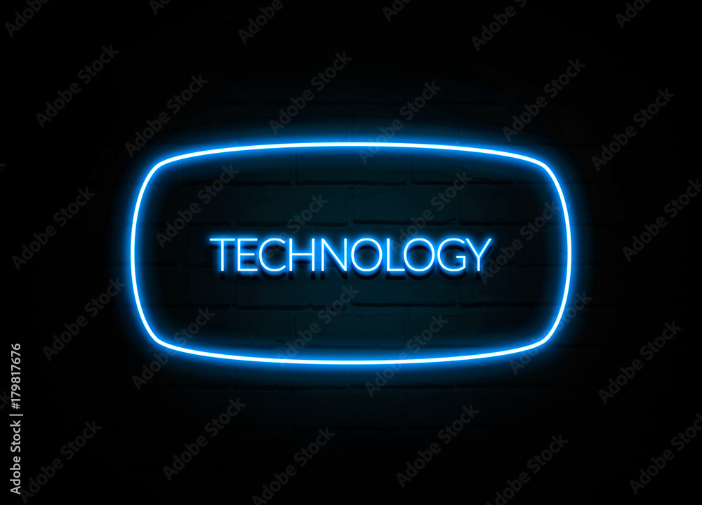 Technology - colorful Neon Sign on brickwall Technology - colorful Neon Sign on brickwall