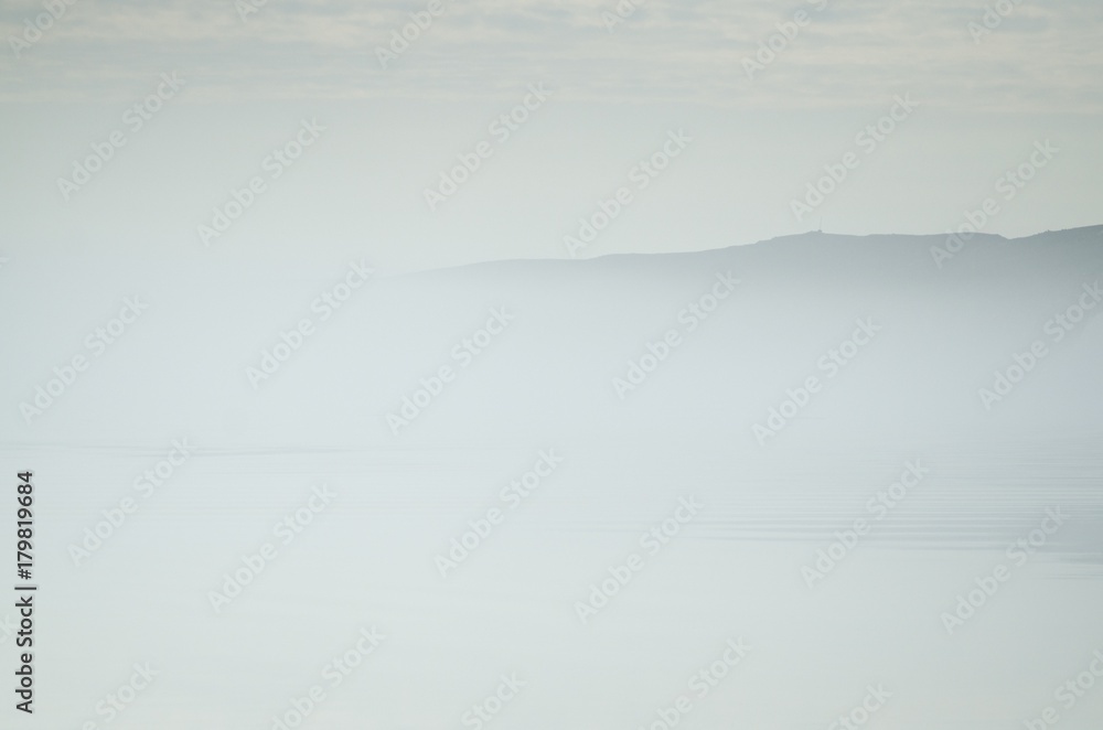 The coast of the arctic island in the fog The coast of the arctic island in the fog
