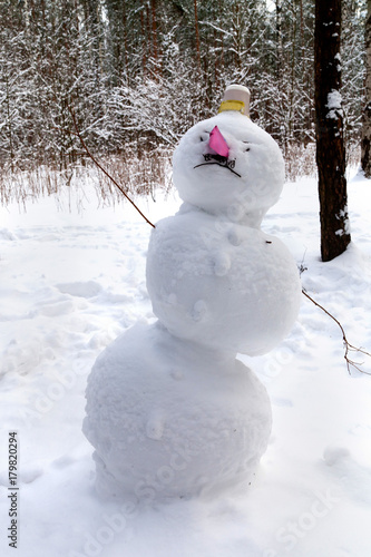 Angry snowman with a pink nose