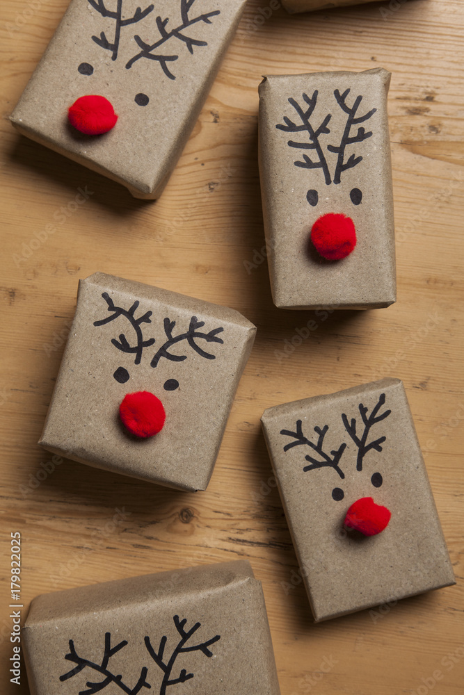 Christmas gift boxes with reindeer faces