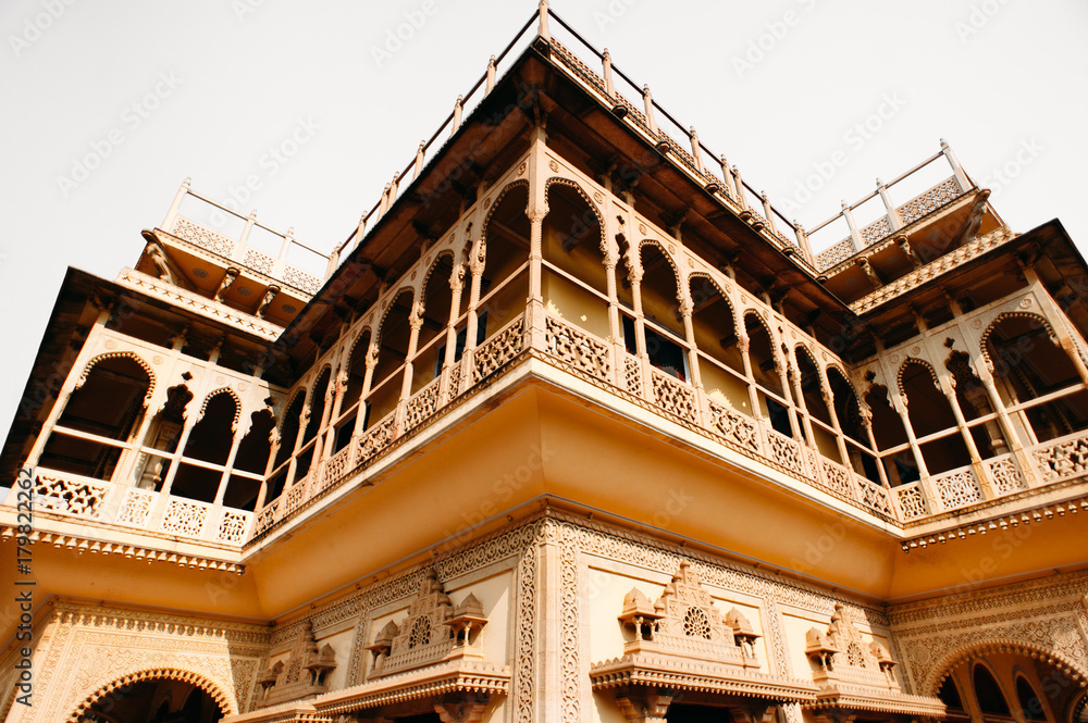 Balcony of Mubarak Mahal in Jaipur City Palace, Rajasthan, India. Maharaja Residence. Old Indian architecture with carving and ornament. Wide angle