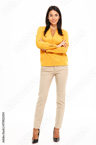 Full length portrait of an attractive confident woman photo