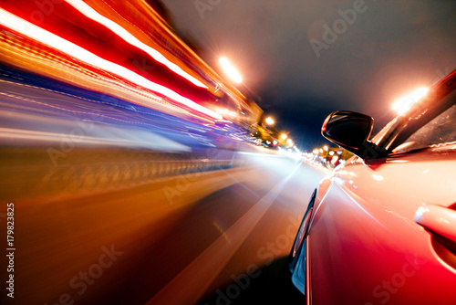 Fotografie Car on the road with motion blur background.