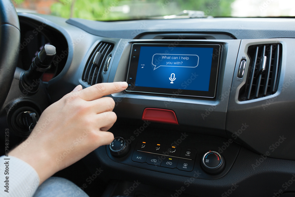 Man hand touching to multimedia system with app personal assistant Man hand touching to multimedia system with app personal assistant