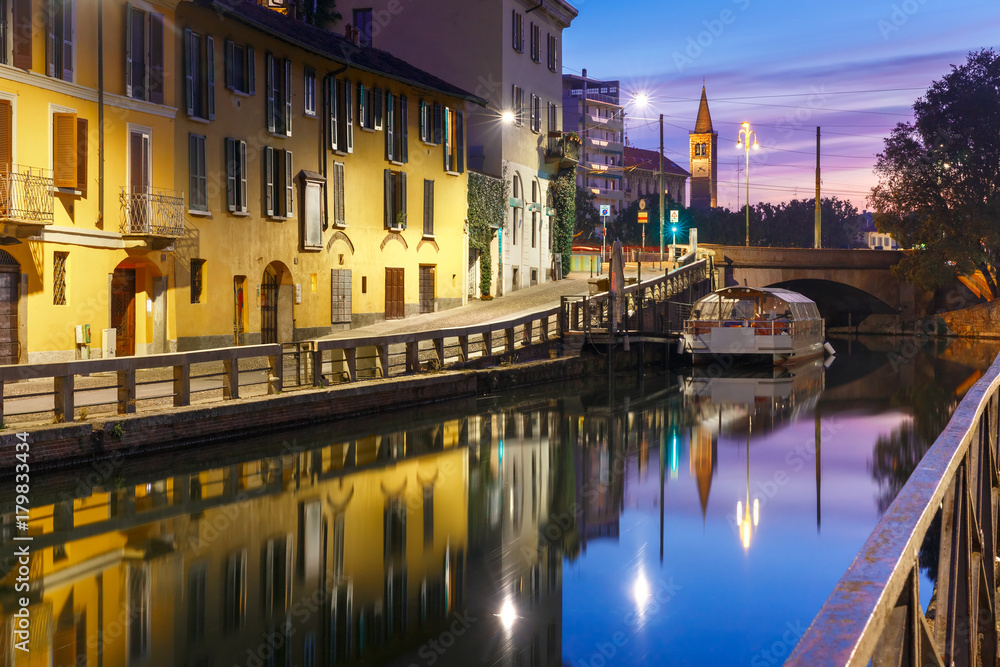 Bridge across the Naviglio Grande canal at sunrise, Milan, Lombardia, Italy
