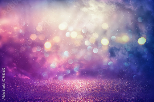 Purple glitter lights background. defocused. © tomertu