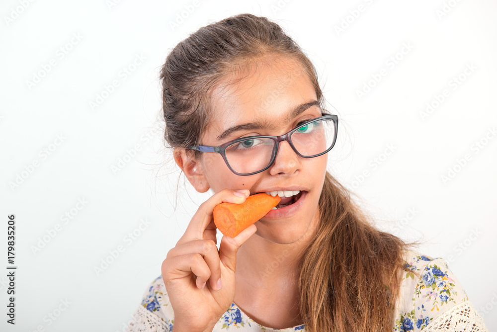 girl with carrot. Vitamins for teenagers. Vegetabl for healthy eating of children. Positive weight loss. Portrait of girl with carrot. girl with glasses. girl bites carrot. Vitamins for eyesight
girl with carrot. Vitamins for teenagers. Vegetabl for healthy eating of children. Positive weight loss. Portrait of girl with carrot. girl with glasses. girl bites carrot. Vitamins for eyesight