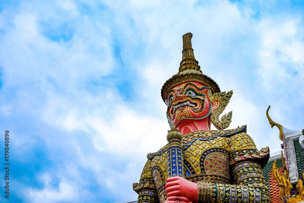 Wat Phra Kaew, or the Temple of the Emerald Buddha and Officially as Wat Phra Si Rattana Satsadaram, is regarded as the most sacred Buddhist temple in Bangkok Thailand,symbol Giant statue.