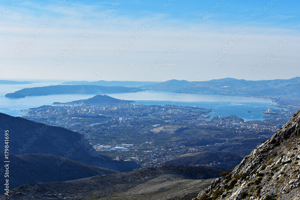 Panoramic view from the mountain rocks at the valley and town Split, Croatia
