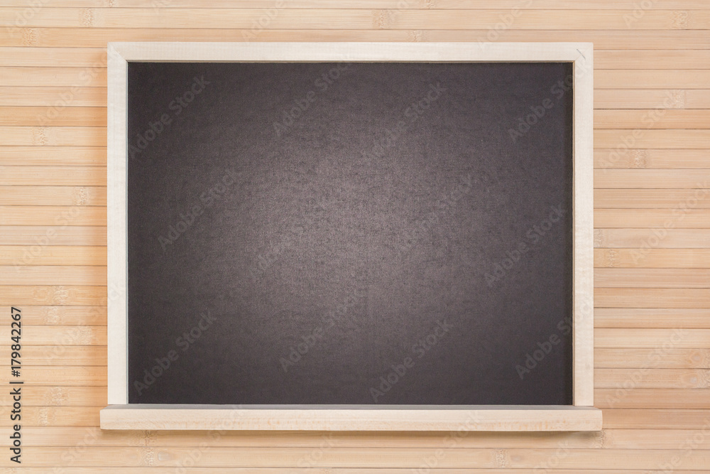 Blackboard on bamboo background