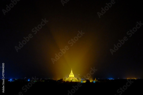 Golden stupa illuminated at night in Bagan, Myanmar
