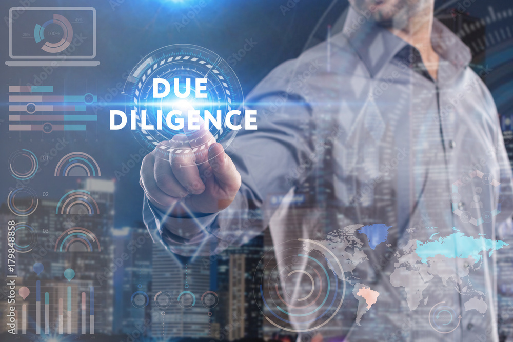 Business, Technology, Internet and network concept. Young businessman working on a virtual screen of the future and sees the inscription: Due diligence Business, Technology, Internet and network concept. Young businessman working on a virtual screen of the future and sees the inscription: Due diligence