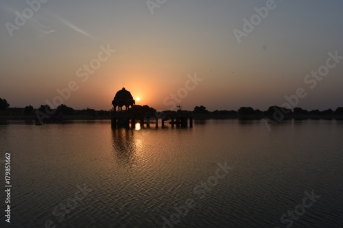 historical monument with sunrise in gadisar lake jaisalmer rajasthan india © SONAL
