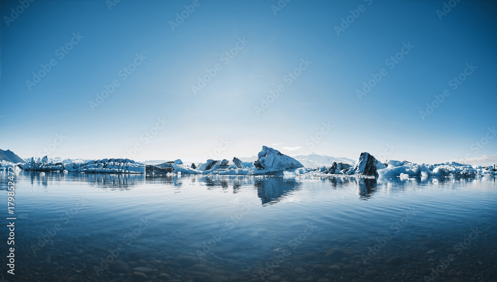 Beatufil vibrant picture of icelandic glacier and glacier lagoon with water and ice in cold blue tones, Iceland, Glacier Bay - obrazy, fototapety, plakaty 