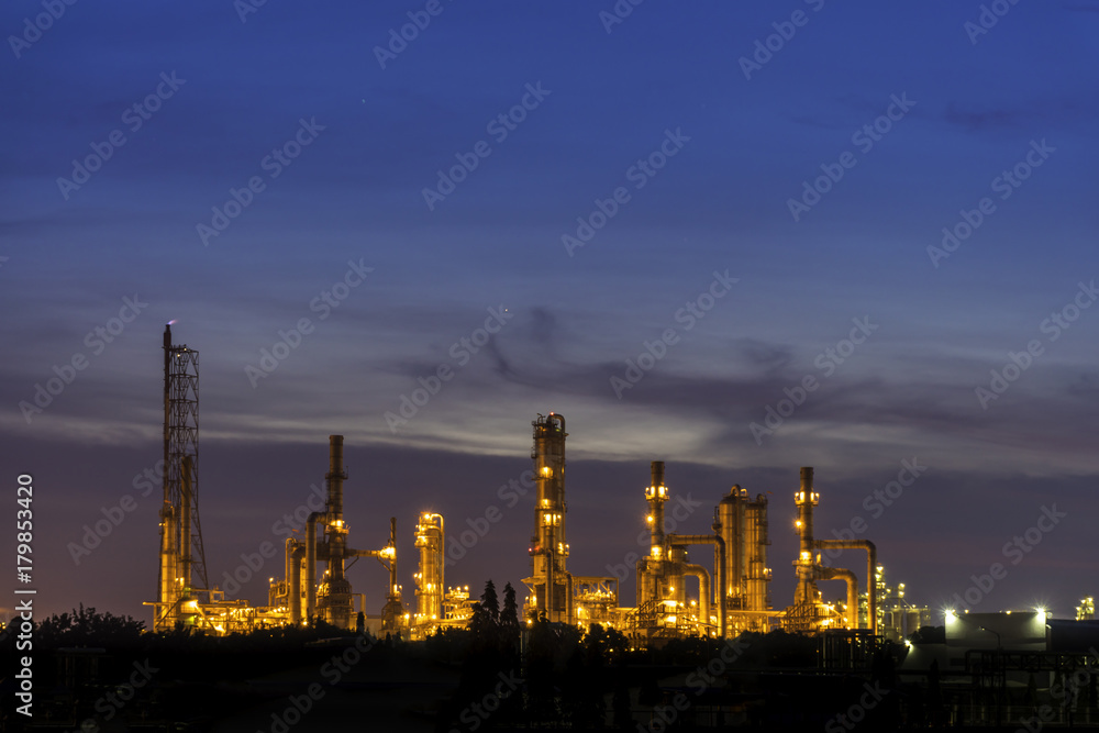 Fototapeta premium Oil refinery and Oil industry at sunset. Space for text