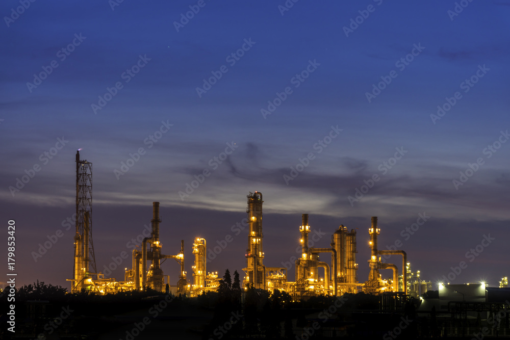 Oil refinery and Oil industry at sunset. Space for text