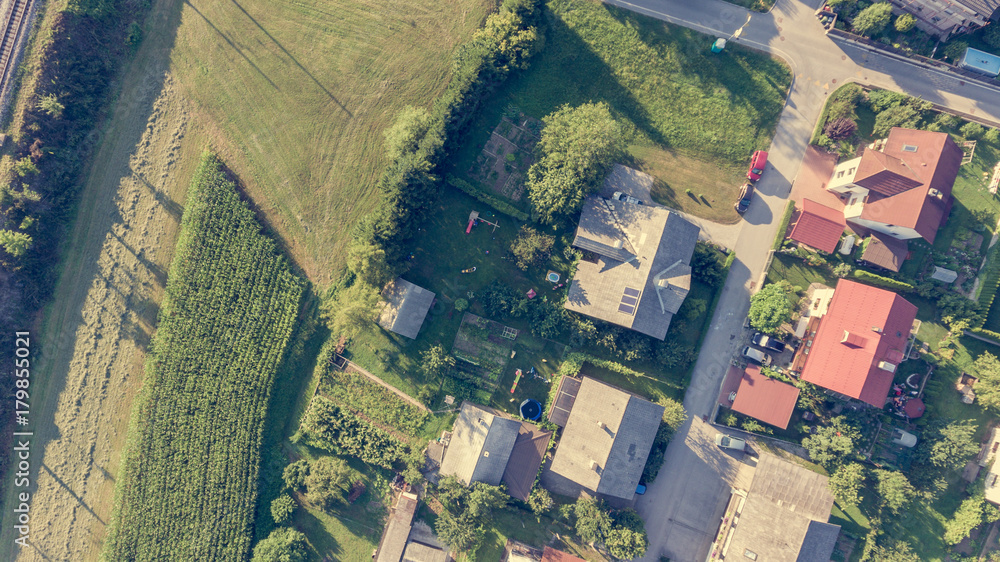 Drop down view of houses in rural environment. Drop down view of houses in rural environment.