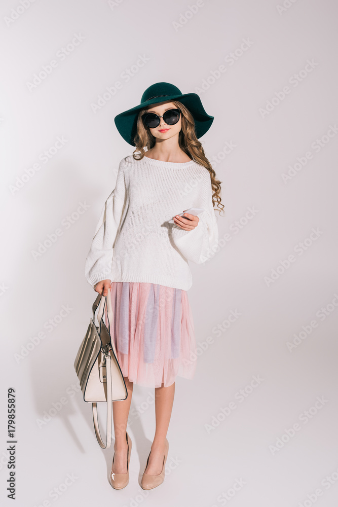 stylish teenage girl with smartphone