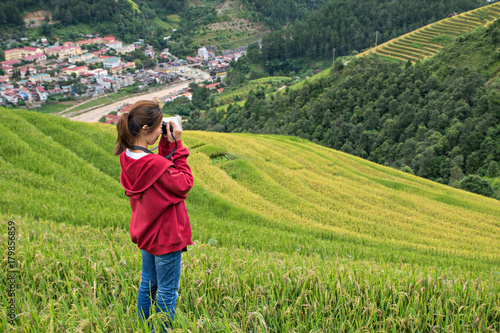 Female adventure backpack traveler in Sapa, Vietnam