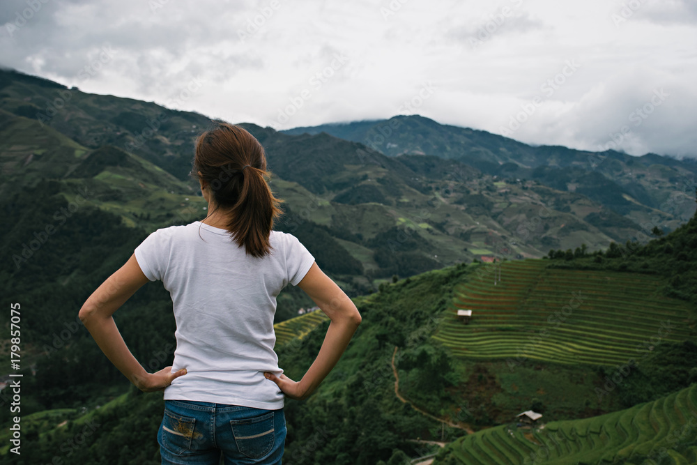 Female adventure backpack traveler in Sapa, Vietnam