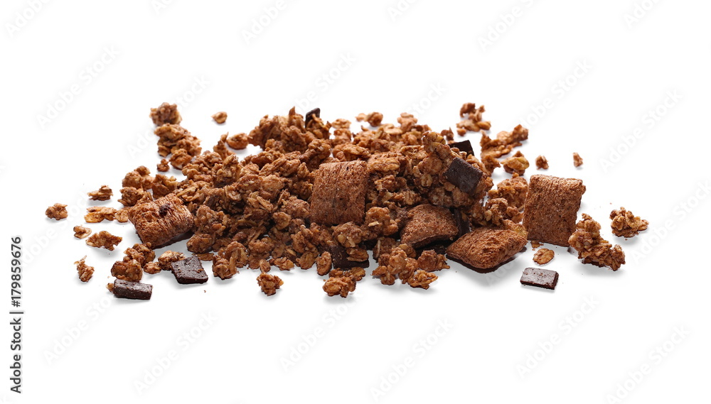 Crunchy granola, muesli pile with chocolate isolated on white background Crunchy granola, muesli pile with chocolate isolated on white background