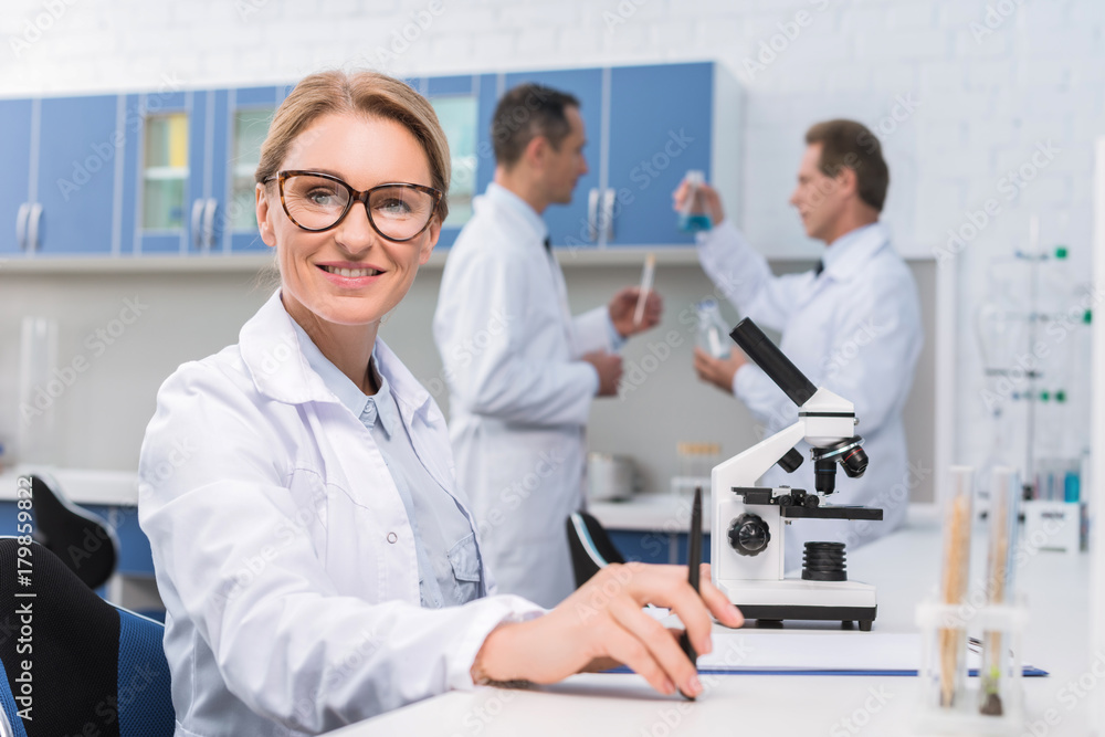 Scientist working in lab Scientist working in lab