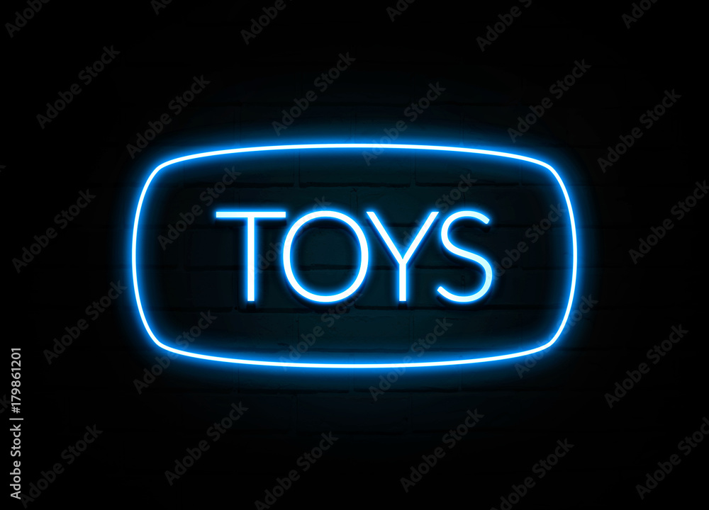 Toys - colorful Neon Sign on brickwall Toys - colorful Neon Sign on brickwall
