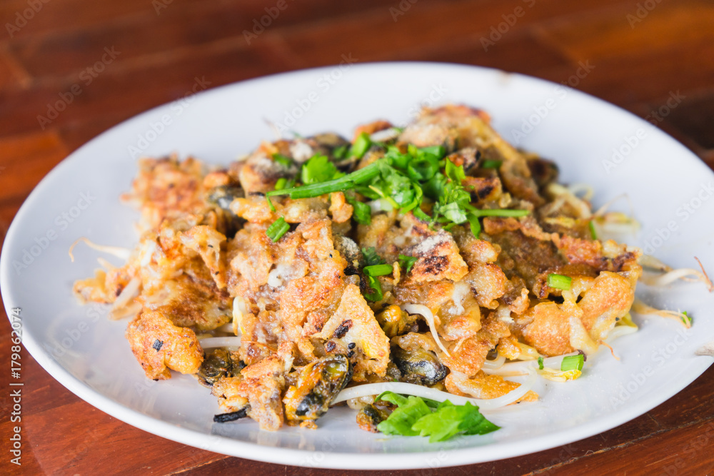 Thai traditional food hoy tod or fried mussel with bean sprout. Thai traditional food hoy tod or fried mussel with bean sprout.